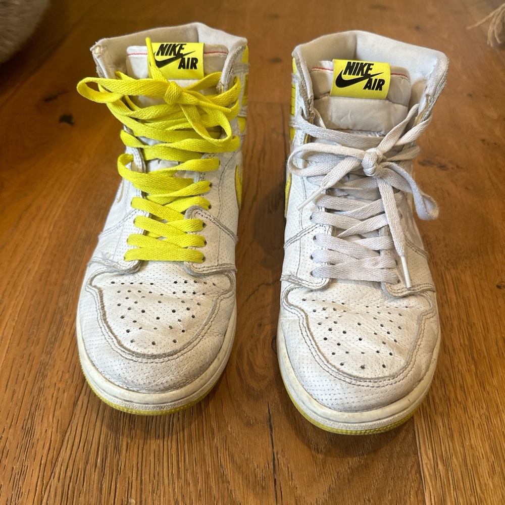 Nike Jordan's high top. Size 8.5 Men's/ 10 Women's. Yellow and white
